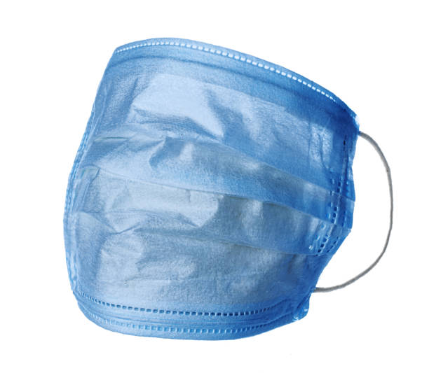 istock Blue medical face masks isolated on white 1302405571