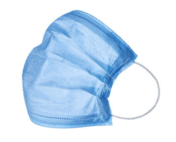 istock Blue medical face masks isolated on white 1302406030