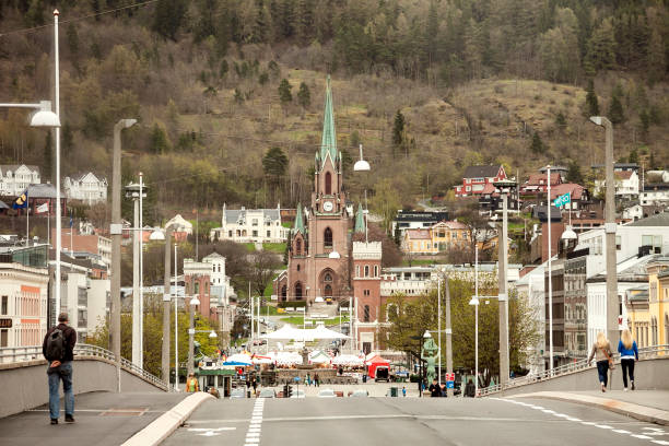 Panoramic view of Drammen downtown towards Bragernes church. Buskerud, Norway Norway - Buskerud - Drammen - The panoramic view of the city downtown along Kirkegata street towards Bragernes church taken from Bybrua bridge across Drammenselva river østfold stock pictures, royalty-free photos & images