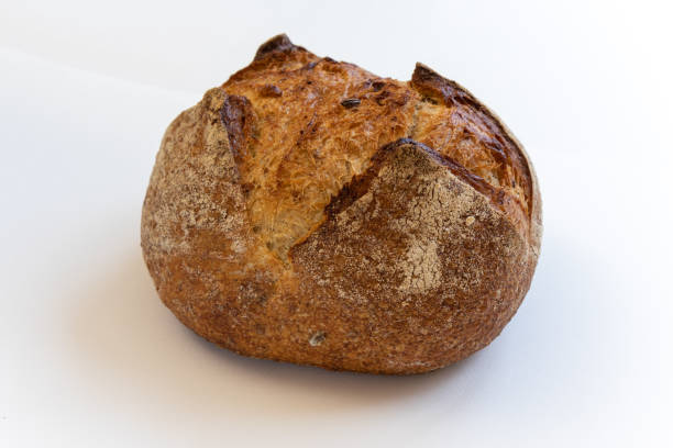 istock Fresh rye bread or whole grain bread, isolated on white background. 1302406174