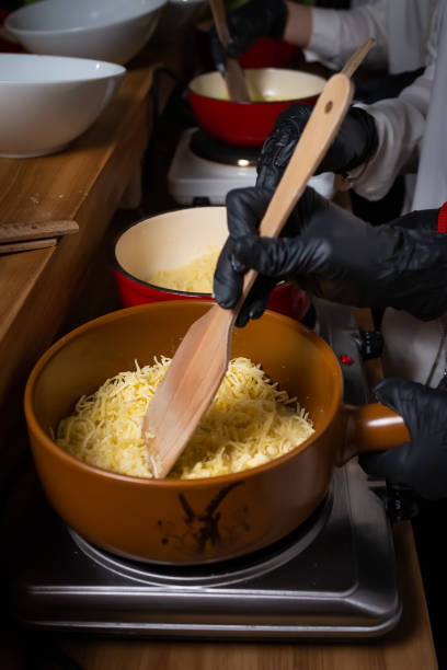 Melting Swiss cheese for fondue