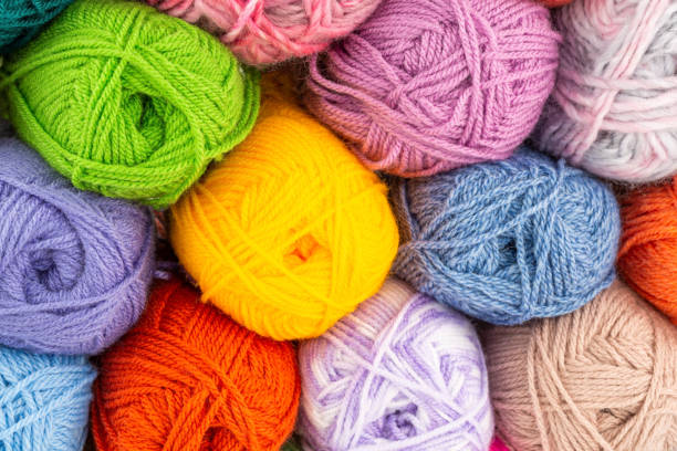istock The stack of colorful knitting yarn clews 1302410950