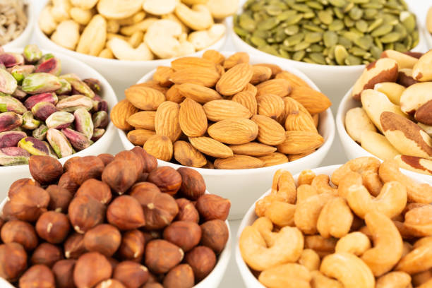 istock The various kind of nuts and seeds 1302411379
