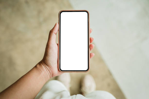 istock Women's hands holding cell telephone blank copy space screen. smart phone with technology concept 1302412469