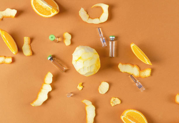 istock Ampoules with vitamin for immunity and orange fruit. Top view 1302412670