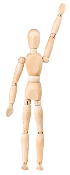 istock Wooden man figurine isolated on white background. Puppet concept. 1302414752