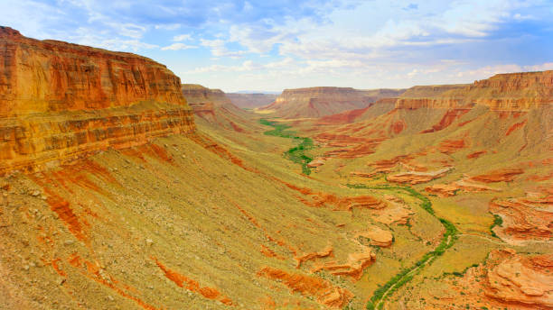 istock Aerial view of valley and cliffs 1302415448