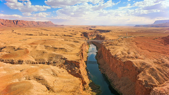Aerial view of Colorado River flowing amidst rock formations, Grand Canyon National Park, Arizona, USA.