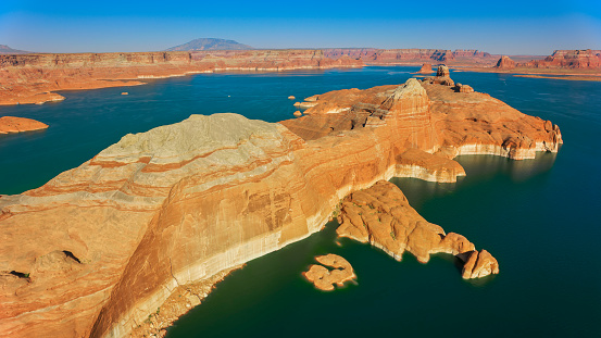 Aerial view of Lake Powell and rocky mountain against sky, Glen Canyon National Recreation Area, Arizona, USA.
