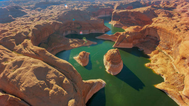 View of Reflection Canyon at Lake Powell Aerial view of Reflection Canyon at Lake Powell, Glen Canyon National Recreation Area, Arizona, USA. glen canyon stock pictures, royalty-free photos & images