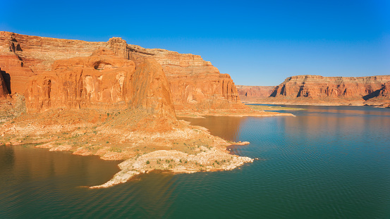 Aerial view of Lake Powell against rocky mountain and sky, Glen Canyon National Recreation Area, Arizona, USA.
