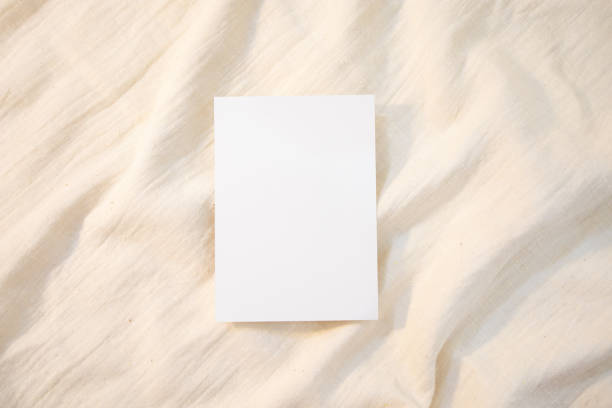 istock Blank Card Mockup designs in an authentic setting white greeting card artworks or stationery designs. empty paper card 1302419267