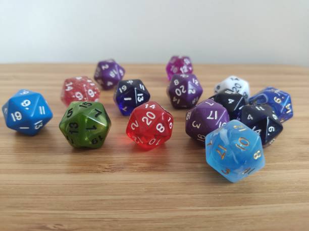 istock Colourful fourteen twelve sided dice 1302420477