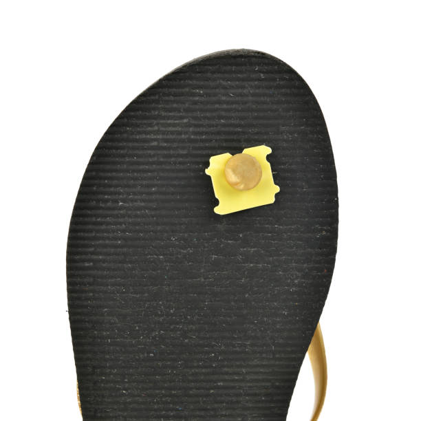 Life hack - Use bread tab to save summer sandals with split holes Using bread clips to save flip-flops with split holes isolated on white background lifehack stock pictures, royalty-free photos & images