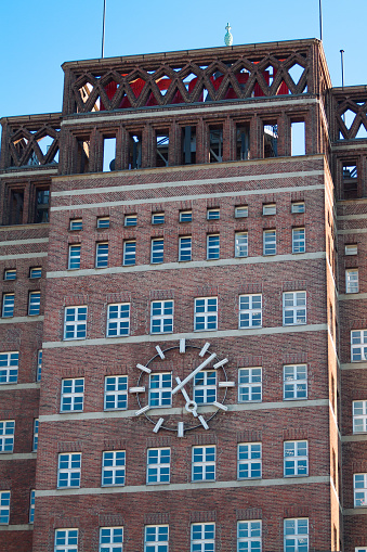 Facade of Wilhelm-Marx-Haus with clock in Duesseldorf, Bulding was made in 1924 as one of first skyscrapers in Germany