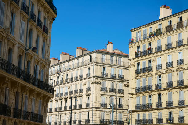 Traditional  residential  buildings in french architecture of Marseille Traditional  residential  buildings in french architecture of Marseille marseille panier stock pictures, royalty-free photos & images