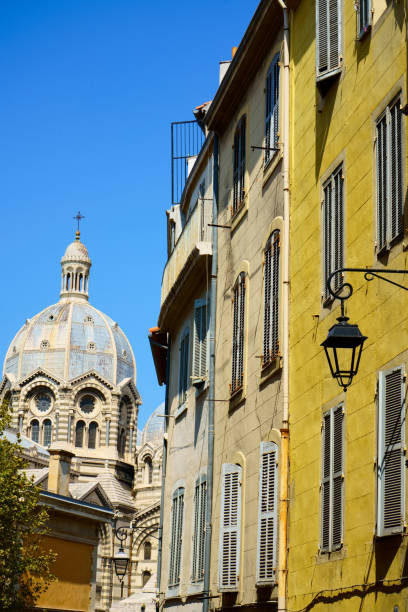 Colorful facade of provence style buiding in Marseille , France Colorful facade of provence style buiding in Marseille , France marseille panier stock pictures, royalty-free photos & images