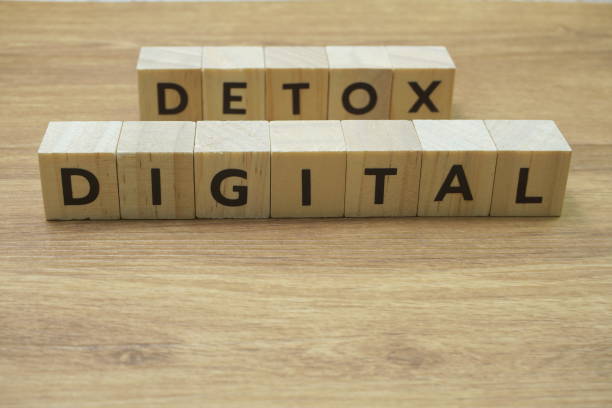 istock Digital Detox alphabet letter on wooden background 1302422043