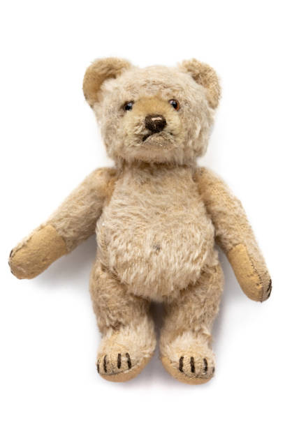 istock cute teddy bear, very old, worn and used 1302422158