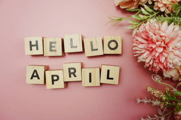 istock Hello April alphabet letter with space copy on pink background 1302426396