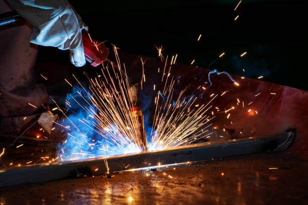 istock The welder is welding steel plates 1302426706