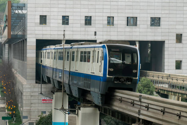istock Light rail runs on bridges at high speed in Chongqing, China 1302427733