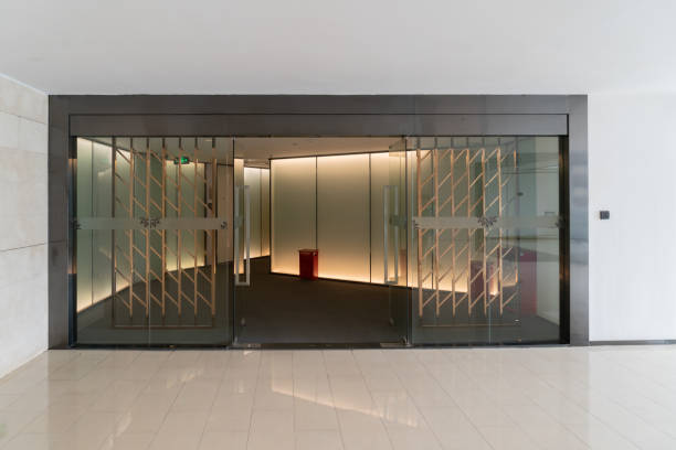 istock A modern office building with glass doors and windows 1302427997