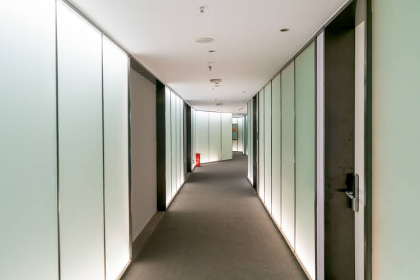 istock A modern office building with glass doors and windows 1302428104
