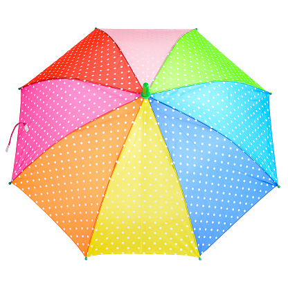 Colorful bright polka dot umbrella isolated on a white background, close-up. Open rainbow-colored umbrella.