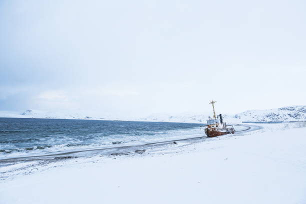 istock old rusty ship on the coast of the arctic ocean 1302433611
