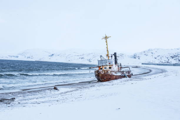istock old rusty ship on the coast of the arctic ocean 1302433678
