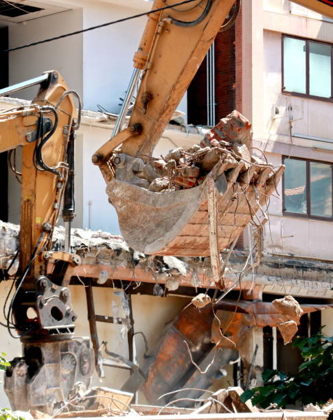 istock Hydraulic crusher excavator working on a demolition site 1302437797