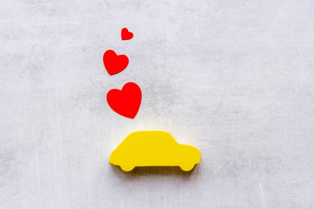 Valentines day celebration with car and heart shapes.