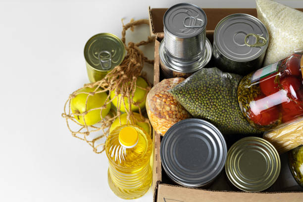 istock Donation box with various food. Pandemic support. 1302440892