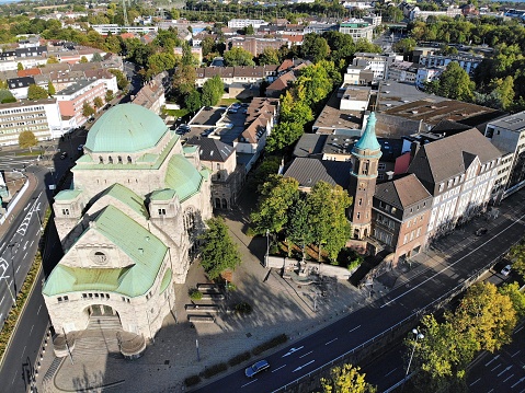 Essen city in Ruhr region, Germany. Aerial view of Old Synagogue and Friedenskirche church.