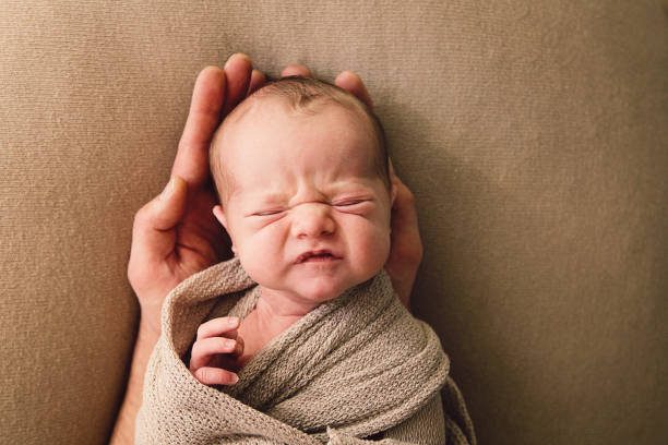 istock Little Boy with Newborn Brother 1302444417