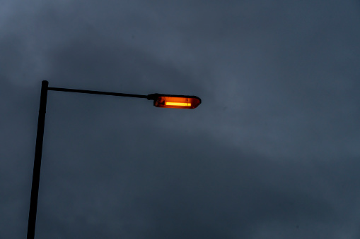 Low Angle View of LED Street Lamp post under clear blue sky