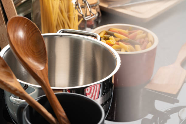 istock Cooking pasta at home in a pot close up 1302444710