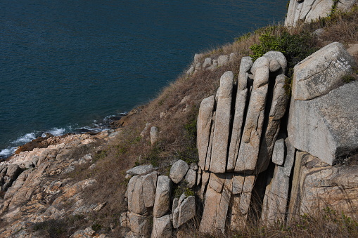 Po Toi is famous for its rock formations, such as the Buddha Hand Rock aka. Palm Cliff, the Coffin Rock, the Tortoise Climbing up the Mountain and the Supine Monk