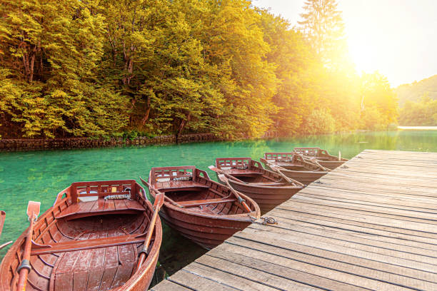 istock Boats on a quiet lake. 1302450507