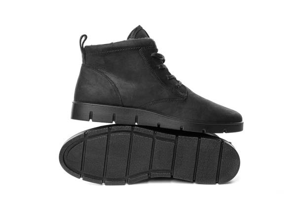 istock Winter shoes isolated on white background. Winter black boots 1302450587
