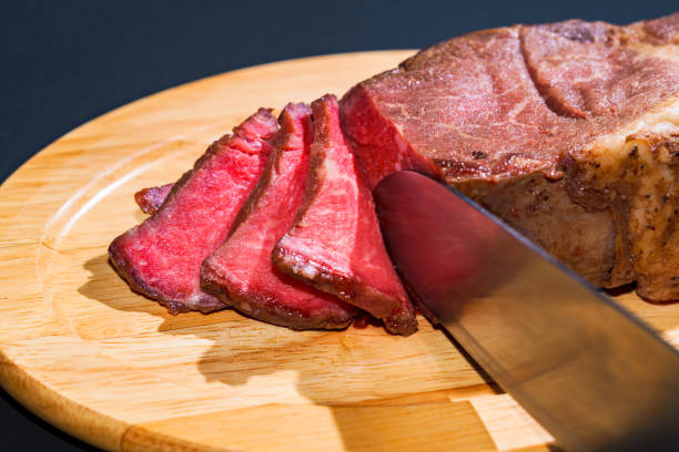 Roast beef on the wooden dish
