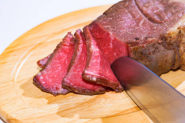 Roast beef on the wooden dish