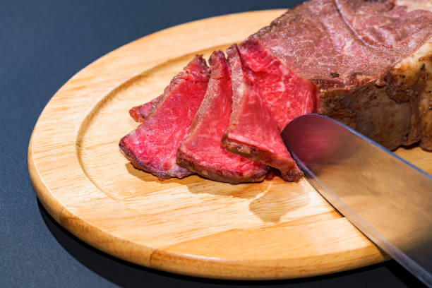 Roast beef on the wooden dish