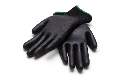 Black rubber gloves to protect hands during cleaning