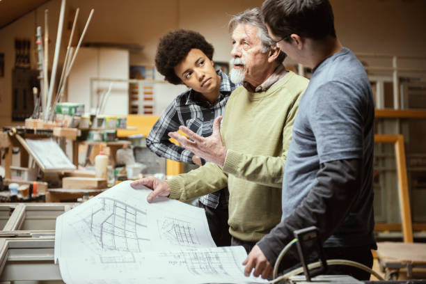 istock Multi-Ethnic Group of Carpenters 1302453652