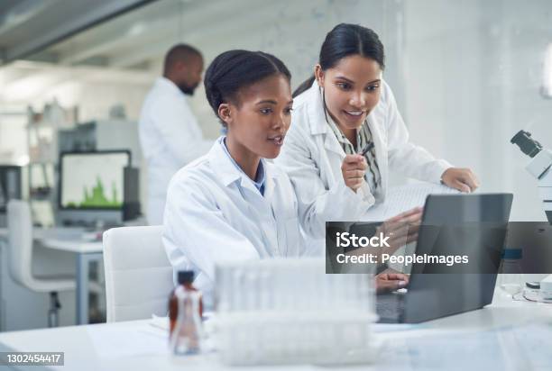 Improving Lives One Collaboration At A Time Stock Photo - Download Image Now - Laboratory, Scientist, Medical Research