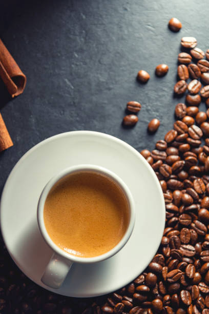 istock Espresso coffee With coffee beans in the morning background. 1302454461