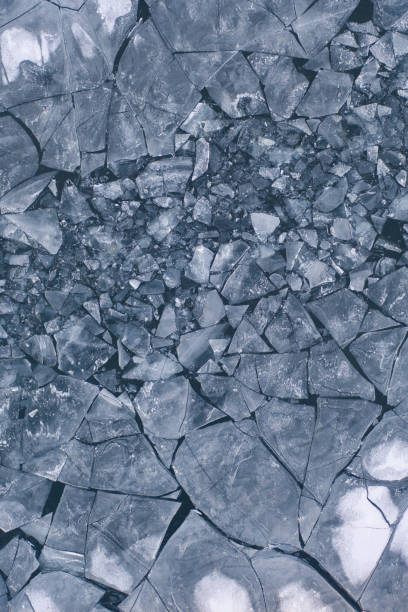 Ice in pieces at sea viewed from above.