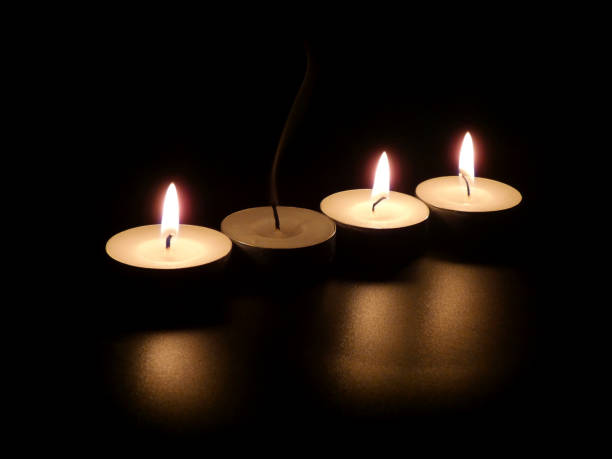 istock line of 4 tea candles 1302456604